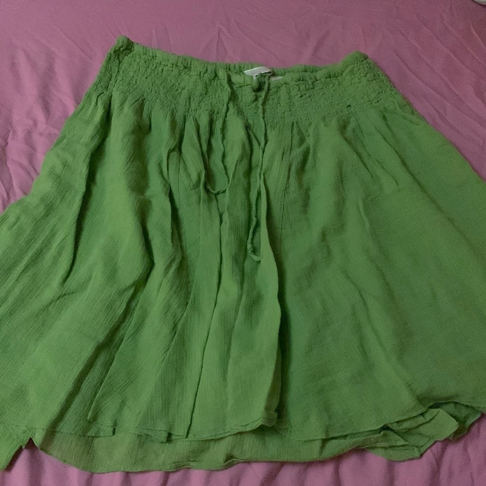 Large, green skirt, medium length